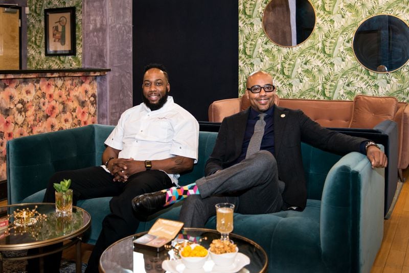Parlor Executive Chef Q Matissé Myers with Bernasconi Consulting Group (left), and Owner Alphonzo Cross (right).