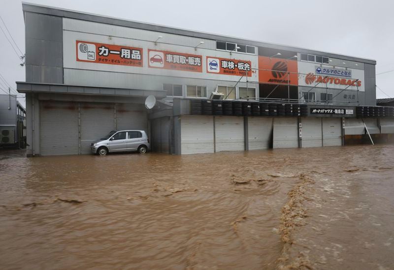 A street is flooded in Wajima, Japan, Sunday, Sept. 22, 2024, following heavy rain in central Japan's Noto peninsula area, where a devastating earthquake took place on Jan. 1. (Yasuko Kishimoto/Kyodo News via AP)