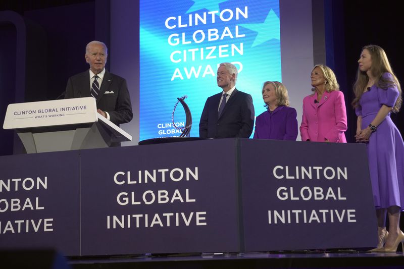 President Joe Biden speaks as he presented with the Global Citizen Award by former President Bill Clinton, former Secretary of State Hillary Clinton, first lady Jill Biden and Chelsea Clinton at the Clinton Global Initiative Monday, Sept. 23, 2024, in New York. (AP Photo/Manuel Balce Ceneta)