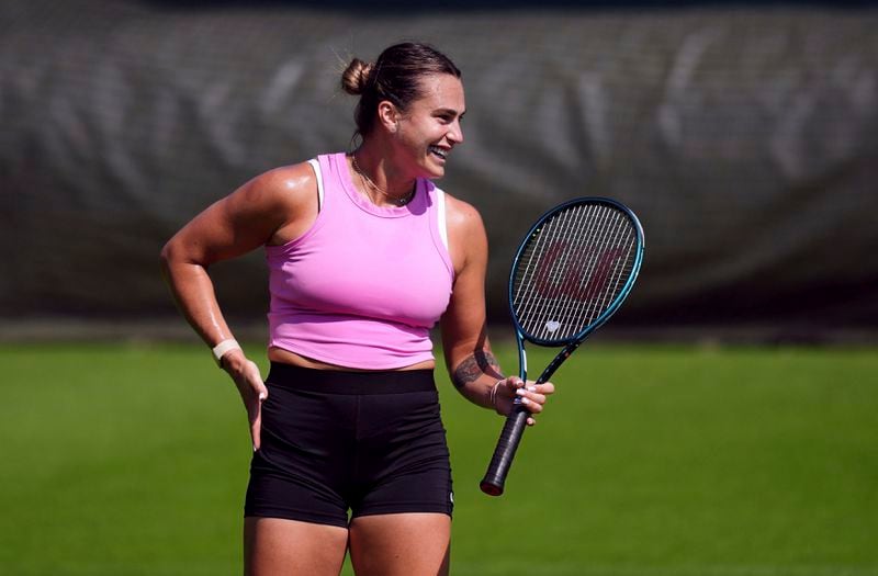 Aryna Sabalenka of Belarus attends a training session ahead of the Wimbledon Championships, at the All England Lawn Tennis and Croquet Club in Wimbledon, London, Wednesday, June 26, 2024. The tournament starts on July 1st. (John Walton/PA via AP)