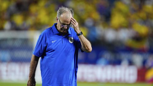 Uruguay's coach Marcelo Bielsa reacts after his team's 1-0 loss against Colombia in a Copa America semifinal soccer match in Charlotte, N.C., Wednesday, July 10, 2024. (AP Photo/Jacob Kupferman)