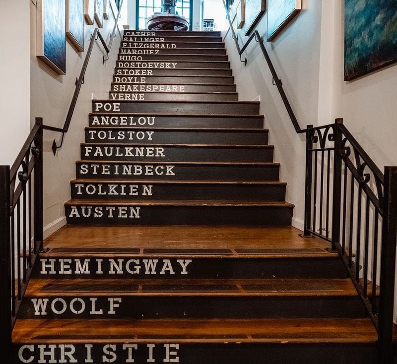 Virginia Highland Books' literary staircase puts a spring in booklovers' steps. The store hosts two book clubs and is starting a third for middle-schoolers. 
(Courtesy of Virginia-Highland Books)