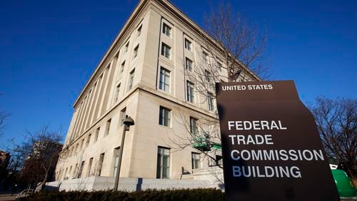 FILE - The Federal Trade Commission building is seen, Jan. 28, 2015, in Washington. The Federal Trade Commission said on Tuesday, July 23, 2024, that it's ordering eight companies that offer “surveillance pricing” to turn in information about their practices, as the agency investigates potential impacts on privacy and consumer protection. (AP Photo/Alex Brandon, File)