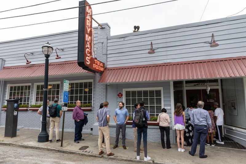 A line forms for the reopening of Mary Mac’s Tea Room in Atlanta on Wednesday, May 8, 2024. The iconic restaurant’s roof collapsed after a storm in March. (Arvin Temkar / AJC)