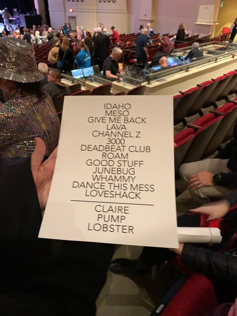 A fan plucked a set list off the stage after the end of the B-52s concert at Classic Center Theater in Athens on January 10, 2023. The name of the hockey team is on there. RODNEY HO/rho@ajc.com