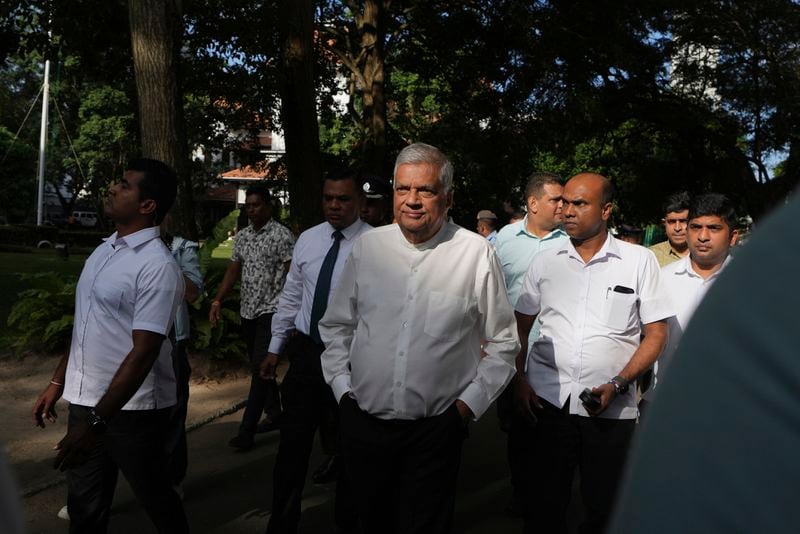 Sri Lankan president and independent presidential candidate Ranil Wickremesinghe arrives to cast his vote in Colombo, Sri Lanka, Saturday, Sept. 21, 2024. (AP Photo/Rajesh Kumar Singh)