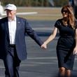 FILE - Republican presidential candidate Donald Trump, left, and his wife Melania arrive to a campaign rally, Nov. 5, 2016, in Wilmington, N.C. (AP Photo/ Evan Vucci, File)