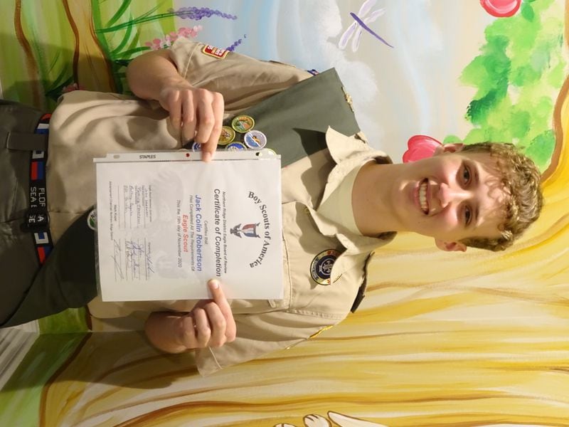 Colin Robertson, of Troop 7153, sponsored by St. Brigid Catholic Church,
whose project was the design and construction of 2 see-saws for the St. John Bosco Academy