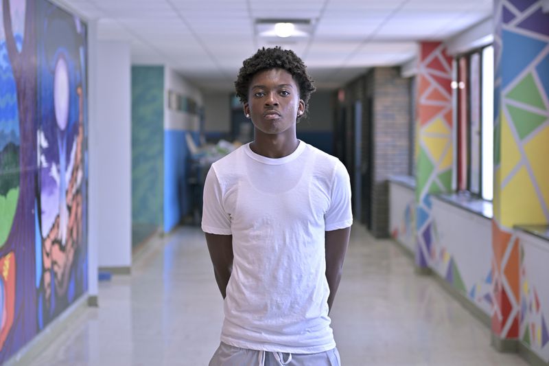 Flerentin “Flex” Jean-Baptiste, 16, of Medford, Mass., poses for a photo at Medford High School, Friday, Aug. 2, 2024, in Medford. (AP Photo/Josh Reynolds)