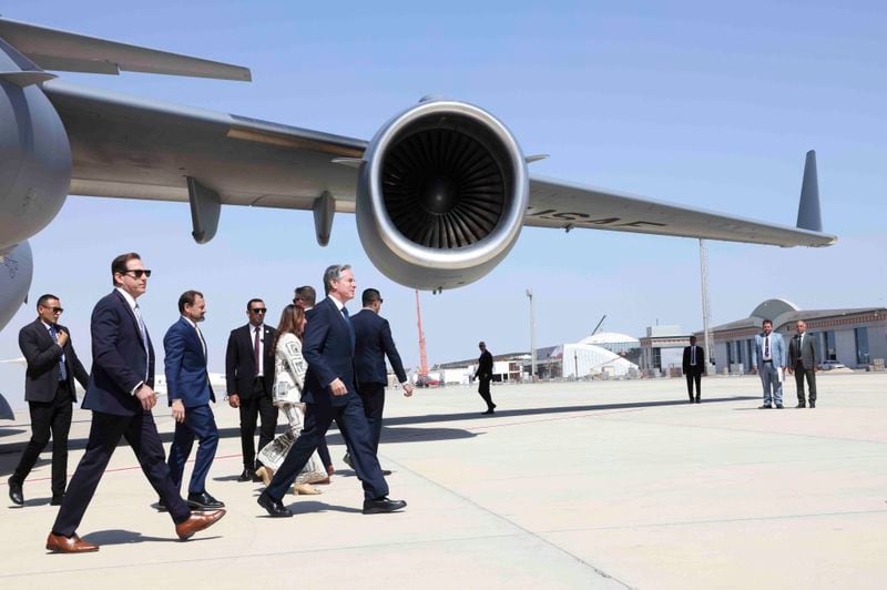 U.S. Secretary of State Antony Blinken walks after arriving at El-Alamein, Egypt, Tuesday, Aug.20, 2024. (Kevin Mohatt//Pool Photo via AP)