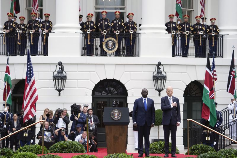 President Joe Biden and Kenya's President William Ruto stand for the U.S. National Anthem during a State Arrival Ceremony on the South Lawn of the White House in Washington, Thursday, May 23, 2024. (AP Photo/Susan Walsh)