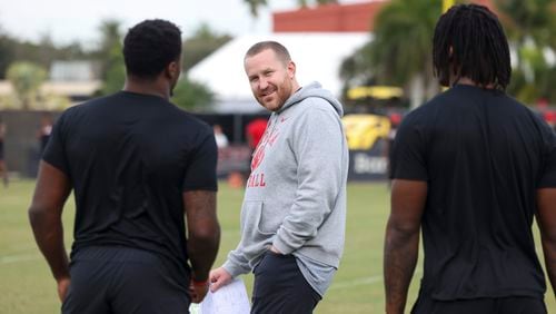 Georgia Co-Defensive Coordinator Glenn Schumann, center, talks with linebackers during practice on the campus of Barry University, Friday, Dec. 29, 2023, in Miami Shores, Florida. Georgia is preparing for their game against Florida State in the Orange Bowl, Saturday, Dec. 30, 2023. (Jason Getz / Jason.Getz@ajc.com)