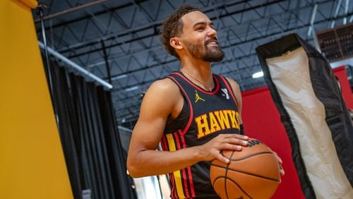 Hawks player Trae Young #11, poses for photos during media day. Hawks media day takes place on Monday, Sept 30, 2024 where media outlets including the Associated Press, Getty, NBA and many others gather to take photos, conduct interviews and gather footage.   (Jenni Girtman for The Atlanta Journal-Constitution)