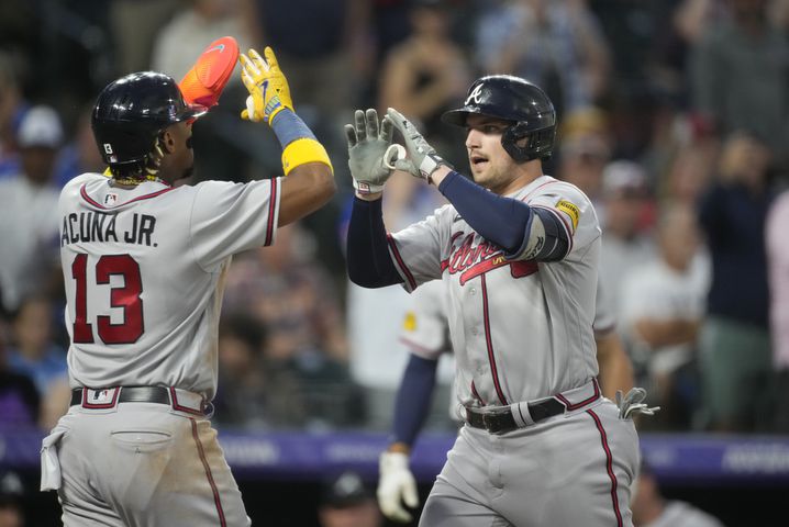 Ronald Acuña Jr. knocked over by fan charging field in Colorado, but Braves  star says he's OK