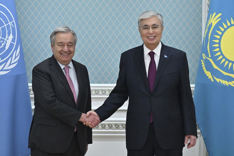 In this photo released by Kazakhstan's Presidential Press Office, President Kassym-Jomart Tokayev, right, and U.N. Secretary-General António Guterres pose for a photo during their meeting on the sidelines of the Shanghai Cooperation Organisation (SCO) summit in Astana, Kazakhstan, on Wednesday, July 3, 2024. (Kazakhstan's Presidential Press Office via AP)