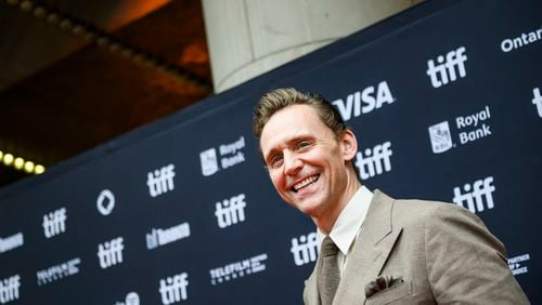 Tom Hiddleston arrives on the red carpet ahead of the premiere of the film "The Life of Chuck", during the Toronto International Film Festival, in Toronto on Friday, September 6, 2024. THE CANADIAN PRESS/Christopher Katsarov/The Canadian Press via AP)