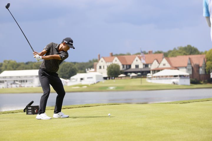 Collin Morikawa tees off on the eighth hole during the final round of the Tour Championship at East Lake Golf Club, Sunday, Sept. 1, 2024, in Atlanta.
(Miguel Martinez / AJC)