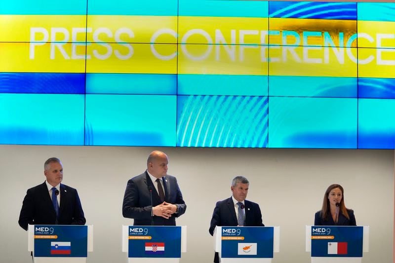 Cypriot Minister of Energy George Papanastasiou, center right, talks with his counterparts of Malta Miriam Dalli, right, Slovenia Bojan Kumer, left, and Croatia Economy Minister Ante Susnjar, center left, during a press conference after the MED9 Energy Ministerial Meeting in southern coastal city of Larnaca, Cyprus, Monday, Sept. 23, 2024. (AP Photo/Petros Karadjias)