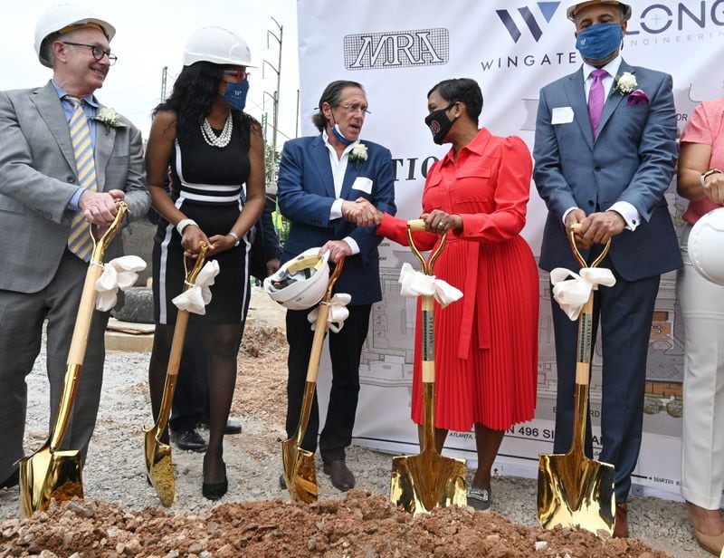 Wingate Companies CEO Mark Schuster (center left) and Atlanta Mayor Keisha Lance Bottoms (center right) speak at the groundbreaking ceremony. (Hyosub Shin / Hyosub.Shin@ajc.com)