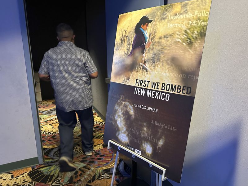 New Mexico Sen. Leo Jaramillo walks into a theater for the first screening of "First We Bombed New Mexico" during the Oppenheimer Film Festival in Los Alamos, New Mexico on Saturday, Aug. 17, 2024. The documentary tells the stories of those who lived near the Trinity Test Site when the U.S. government detonated the first atomic bomb and the Native Americans who worked in the uranium industry. (AP Photo/Susan Montoya Bryan)