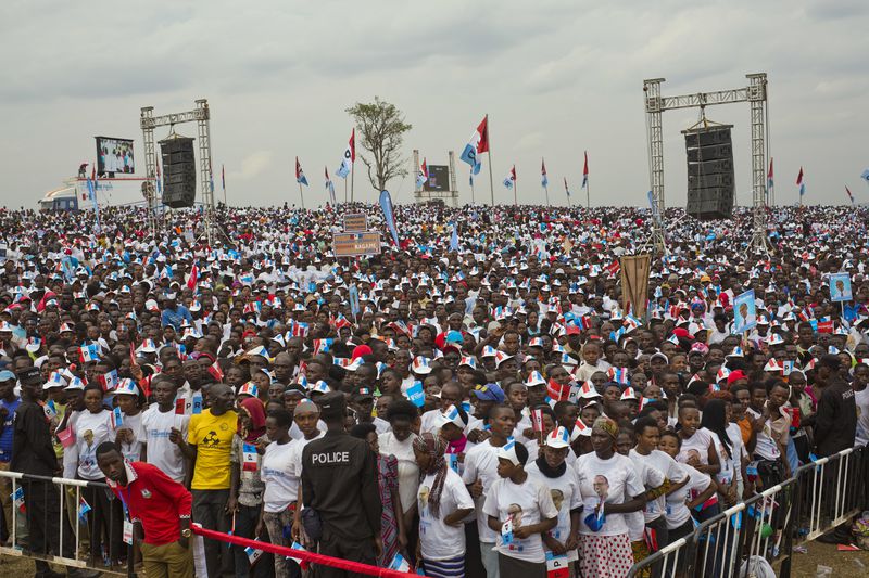 FILE - Supporters of Rwanda's President Paul Kagame, center, attend an election campaign rally on the hills overlooking Kigali, Rwanda, on Aug. 2, 2017. (AP Photo/Jerome Delay, File)