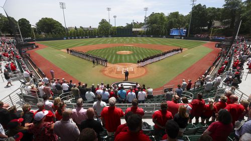 Army, left, and Georgia line up during the U.S. national anthem before their game in the NCAA division I baseball Athens Regional at Foley Field, Friday, May 31, 2024, in Athens, Ga. Georgia won 8-7. (Jason Getz / AJC)
