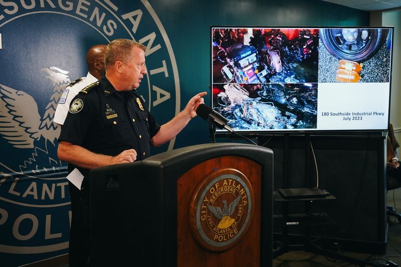 Atlanta Police Department Chief Darin Schierbaum, flanked by ATF Special Agent Asac Beau Kolodka (left) and Atlanta Fire and Rescue Department Chief Rod Smith (right), provides updates on the investigation into the Fourth of July weekend attacks on the training center at the Atlanta Police Headquarters on Tuesday, Aug. 1, 2023. The criminal activity has been categorized as arson, leading to the involvement of the ATF and Fire Department officials in the case. Increased rewards are now being offered, encouraging individuals with information on the crimes and those responsible to come forward. (Photo: Olivia Bowdoin / Atlanta Journal-Constitution)