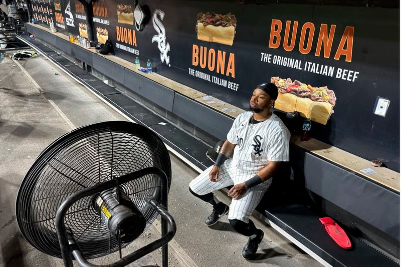 Chicago White Sox's Corey Julks sits in the end of the bench after the team's 5-3 loss to the New York Mets Saturday, Aug. 31, 2024, after the White Sox tied the franchise season record of 106 losses in Chicago. (AP Photo/Charles Rex Arbogast)