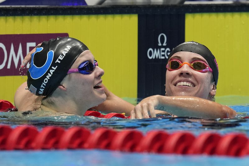 Regan Smith and Alex Shackell after the Women's 200 butterfly finals Thursday, June 20, 2024, at the US Swimming Olympic Trials in Indianapolis. (AP Photo/Darron Cummings)