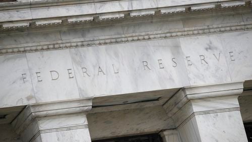 FILE - The Federal Reserve building in seen in Washington, May 22, 2020. (AP Photo/Patrick Semansky, File)