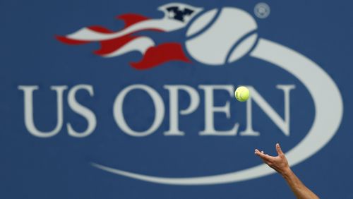 FILE - Philipp Kohlschreiber, of Germany, serves to John Millman, of Australia, during the third round of the U.S. Open tennis tournament in New York, Sept. 2, 2017. The 2024 U.S. Open begins Monday, Aug. 26.(AP Photo/Adam Hunger, File)