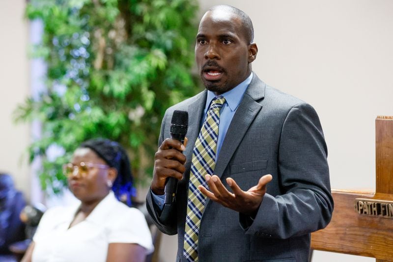 Eddie Gordon talks to Clayton County residents during a forum organized by Women of Clayton County at Harvest Baptist Tabernacle Church on Thursday, June 6. (Miguel Martinez / AJC)