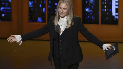 FILE - Barbra Streisand presents the award for best musical at the Tony Awards in New York on June 12, 2016. (Photo by Evan Agostini/Invision/AP, File)