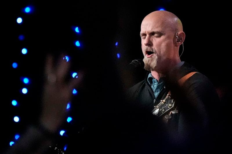 Senior Worship Pastor Joel Goddard sings during a Sunday service at Bethlehem Church, Sunday, Sept. 8, 2024, in Bethlehem, Ga. Colt Gray, 14, has been charged with murder over the killing of two students and two teachers at Apalachee High School in Barrow County, outside Atlanta, on Wednesday. (AP Photo/Mike Stewart)