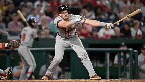 Atlanta Braves' Sean Murphy strikes out swinging for the second out of the seventh inning of a baseball game against the Washington Nationals, Wednesday, Sept. 11, 2024, in Washington. (AP Photo/John McDonnell)