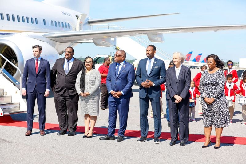 U.S. Sen. Jon Ossoff (left), D-Ga.; U.S. Rep. Nikema Williams (third from left), D-Atlanta; Mayor Andre Dickens (third from right) and others were on hand at Hartsfield-Jackson International Airport for the arrival of Kenya's President William Ruto and first lady Rachel Ruto on Monday. 