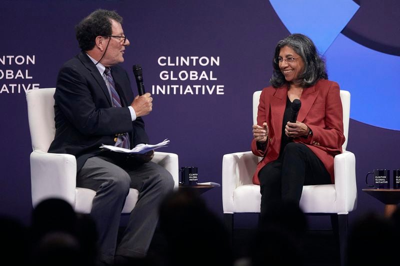 Binaifer Nowrojee, President of Open Society Foundations, right, speaks with a journalist during the Clinton Global Initiative, on Monday, Sept. 23, 2024, in New York. (AP Photo/Andres Kudacki)