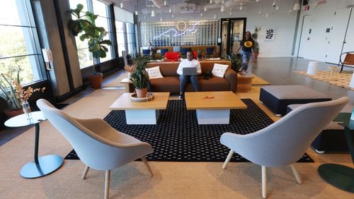 The WeWork coworking space at 750 Ponce de Leon Ave in Atlanta. WeWork is a commercial real estate company that offers flexible shared workspaces for entrepreneurs and services for other enterprises. (Miguel Martinez for The Atlanta Journal-Constitution)