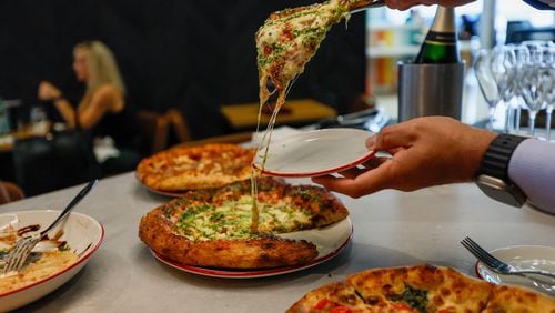 Gourmet pizza is among the offerings at Southern National Market and Pizza Boxx at Hartsfield-Jackson Atlanta International Airport.
(Miguel Martinez / AJC)