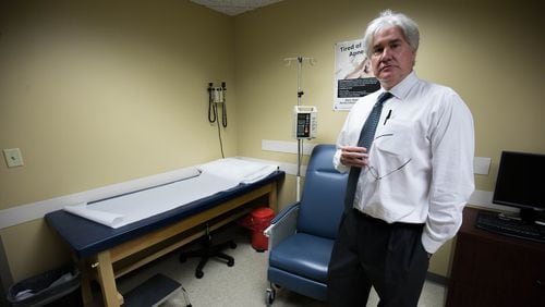 Dr. Michael Lacey poses for a portrait at NeuroTrials Research in Sandy Springs,. The doctors and clinical investigators at NeuroTrials Research are studying three medications showing promise for treating Alzheimer?s. BRANDEN CAMP/SPECIAL