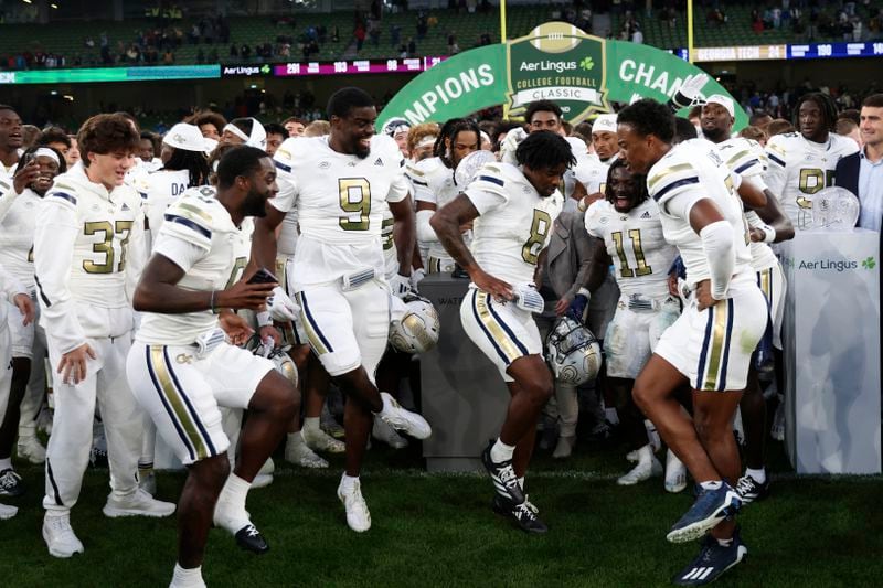 Georgia Tech players show off their dance moves after Saturday's win over Florida State in Dublin, Ireland.