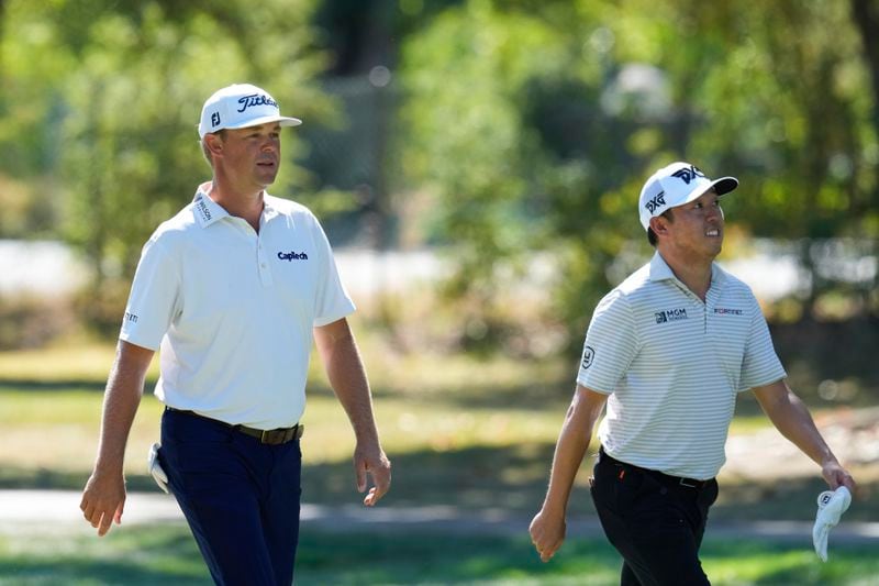 Patton Kizzire, left, and David Lipsky walk along the fairway on the third hole during the third round of the Procore Championship golf tournament at the Silverado Resort North Course, Saturday, Sept. 14, 2024, in Napa, Calif. (AP Photo/Godofredo A. Vásquez)