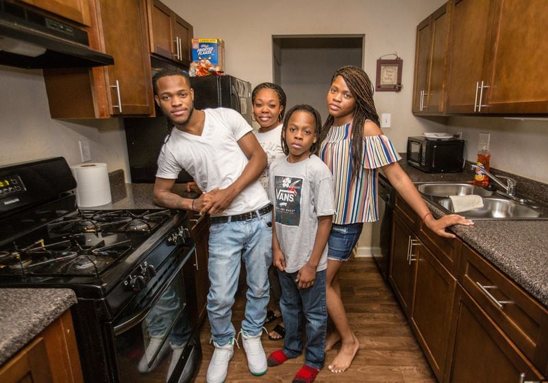 Tiffany Ester does what she can with her unemployment benefits to buy food for her three kids. (Jenni Girtman / For the AJC)