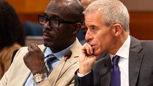 Young Thug's attorneys Keith Adams, left, and Brian Steel during the ongoing “Young Slime Life” gang trial at the Fulton County Courthouse in Atlanta on Friday, July 19, 2024. (Seeger Gray / AJC)