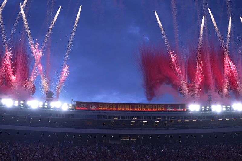 Fireworks fill the sky over Arrowhead Stadium as the Kansas City Chiefs' Super Bowl XVIII championship banner is unveiled before the start of an NFL football game between the Chiefs and the Baltimore Ravens Thursday, Sept. 5, 2024, in Kansas City, Mo. (AP Photo/Ed Zurga)