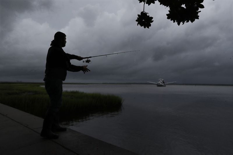 St Marys resident Scott Vincent, who spent the last few days working storm preparations in the city, finally got some time to try his luck fishing late Wednesday morning as Hurricane Dorian traveled up the coast from Florida to Georgia.    Curtis Compton/ccompton@ajc.com