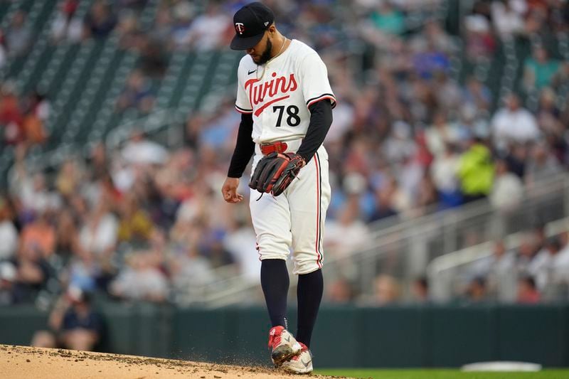 Minnesota Twins starting pitcher Simeon Woods Richardson (78) stands on the mound after a 2-run home run by Atlanta Braves' Michael Harris II during the first inning of a baseball game Tuesday, Aug. 27, 2024, in Minneapolis. (AP Photo/Abbie Parr)