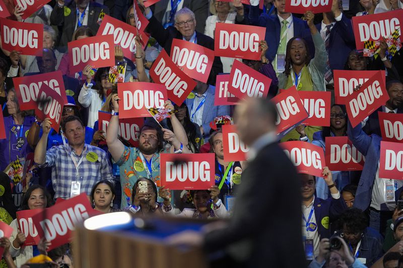 Supporters cheer as Second Gentleman Douglas Emhoff speaks during the Democratic National Convention Tuesday, Aug. 20, 2024, in Chicago. (AP Photo/Charles Rex Arbogast)