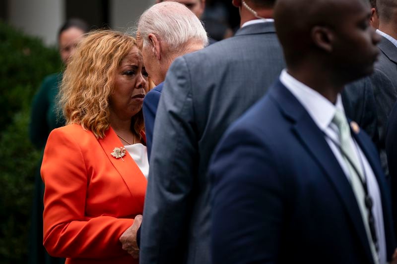 U.S. Rep. Lucy McBath, shown speaking with President Joe Biden at a gun safety event at the White House in September, remains a supporter of the president's reelection effort. “We do a great disservice to ourselves as Democrats to say at this point, ‘Step aside, let somebody else run,’ ” the Marietta Democrat said at a gathering over the weekend at Ebenezer Baptist Church. (Kent Nishimura/The New York Times) 