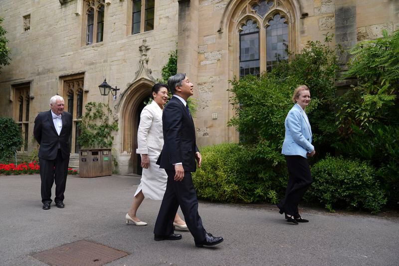 FILE - Head of Baliol College Helen Ghosh, right, and Chancellor of the University of Oxford Chris Patten, left, walk with, Emperor Naruhito of Japan and his wife Empress Masako, as they arrive for a visit to Balliol College in Oxford, England, during their state visit to Britain, Friday, June 28, 2024. Naruhito and the Empress Masako, who studied at Oxford a few years after her husband, wrapped up a weeklong trip to Britain on Friday. Their itinerary combined the glitter and ceremony of a state visit with four days of less formal events that gave the royal couple an opportunity to revisit their personal connections to Britain. ( Joe Giddens/Pool Photo via AP, File)